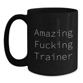Funny Trainer Gifts from Friends, Unique Birthday Presents for Trainers with Amazing F--king Trainer Quote, Black Coffee Mug, 11oz or 15oz, Microwave and Dishwasher Safe - Main